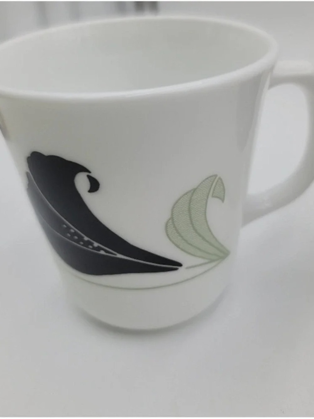 White Ceramic Mug with Black and Light Green Wave Motif